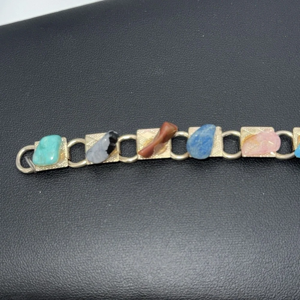 Vintage Gold tone link charm bracelet with various colored “stones” boho hippie